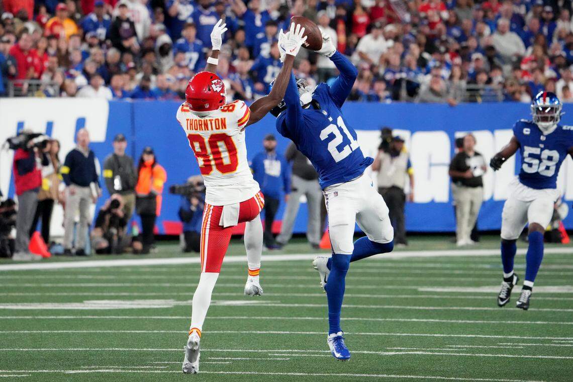 New York Giants cornerback Paulson Adebo (No. 21) breaks up a pass intended for Kansas City Chiefs wide receiver Tyquan Thornton (No. 80) during an NFL Week 3 game at MetLife Stadium in East Rutherford, New Jersey, on Sunday, Sept. 21, 2025.