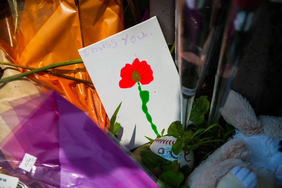 A makeshift memorial was set up by family and friends in front of the house at 7212 N Avalon St in northwest Kansas City, where a fire took the lives of three boys, 10-year-old Chace Freeman, 4-year-old Achilles Hardy and 2-year-old Maxwell Hardy on Wednesday, July 14, 2021.