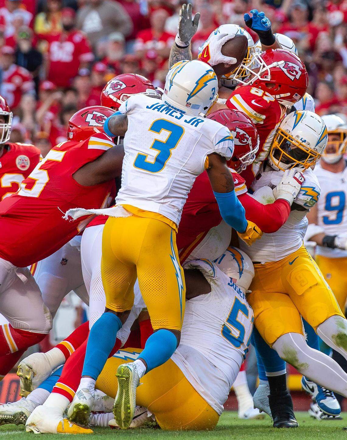 In the second frame in the series, we see Kelce’s head and the ball and a set of hands from a Chargers player reaching for the ball. The photo would be a telling image of the moment but there were other images to choose from.