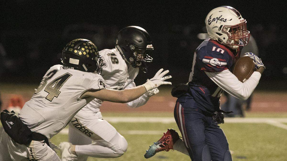 Jacob Parrish, #10. of Olathe North headed to the end zone for the first touchdown in the game against Blue Valley Friday, November 22, 2019 at the Olathe District Activity complex. Olathe North dominated the first half 21-0.
