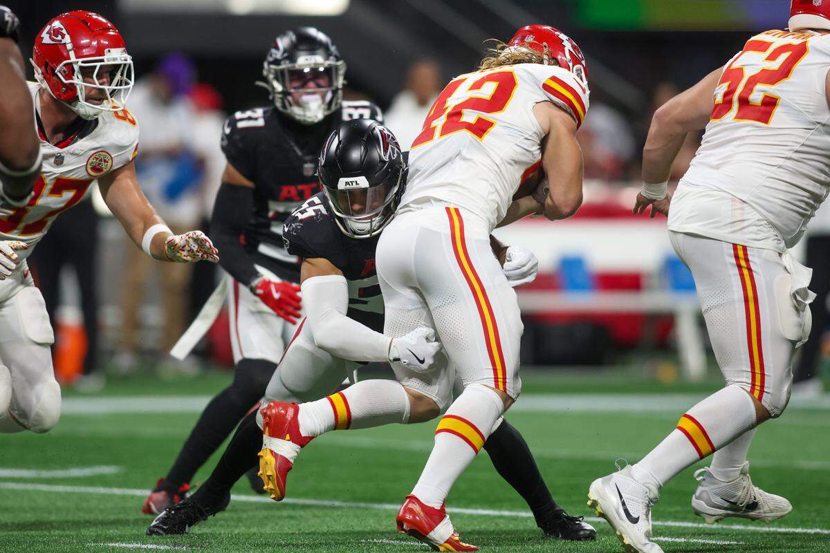 Kansas City Chiefs running back Carson Steele (No. 42) busts one up the middle against the Atlanta Falcons during Sunday night’s game at Mercedes-Benz Stadium.