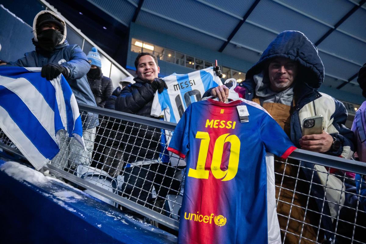 Messi fans hold his jerseys after the Concacaf Champions Cup match of Sporting KC vs. Inter Miami CF on Wednesday, Feb. 19, 2025, at Sporting Park.