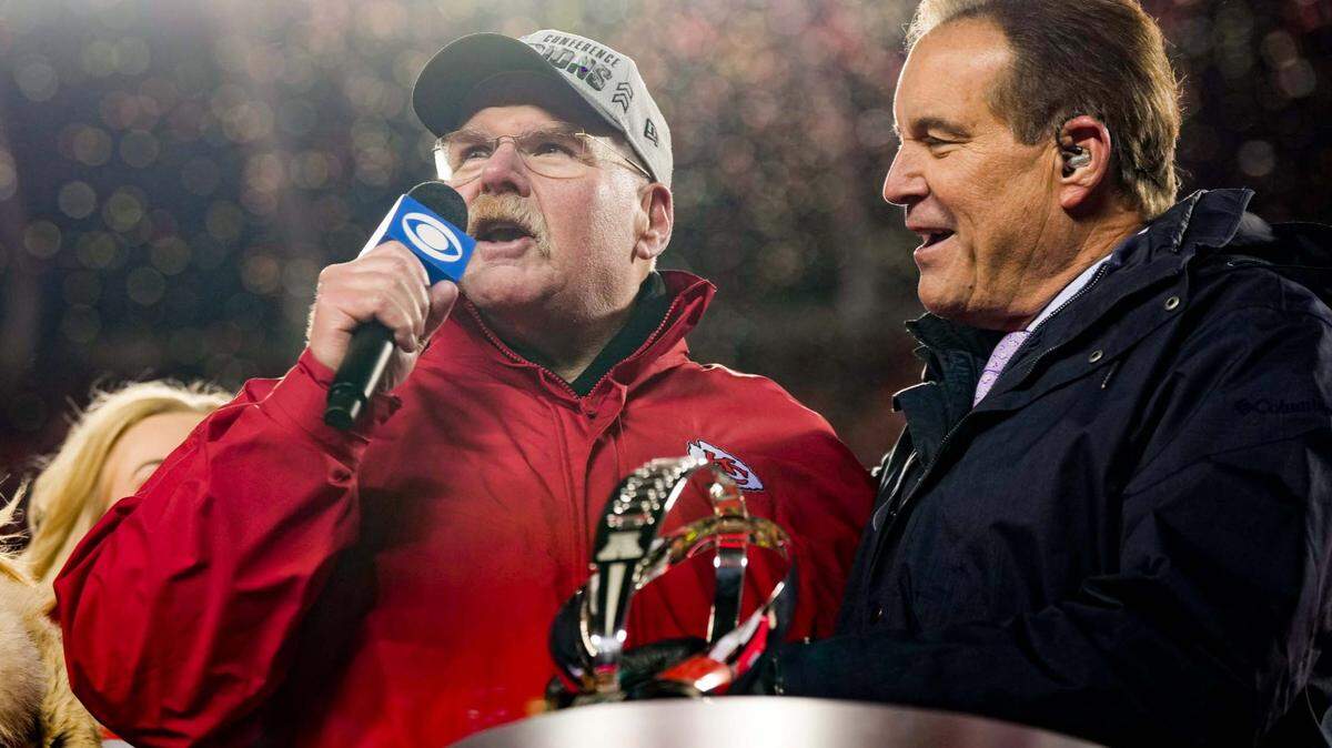 Chiefs head coach Andy Reid addressed the crowd as CBS broadcaster Jim Nantz looked on after the AFC Championship game at GEHA Field at Arrowhead Stadium.