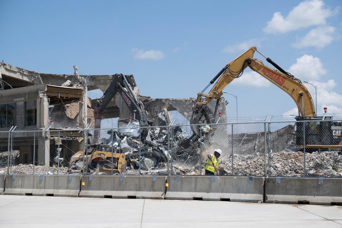 Demolition of the old Kansas City International airport terminals in progress, in Kansas City, Missouri on July 17. Demolition of the old terminals within five years is a condition of the current airline use and lease agreement.