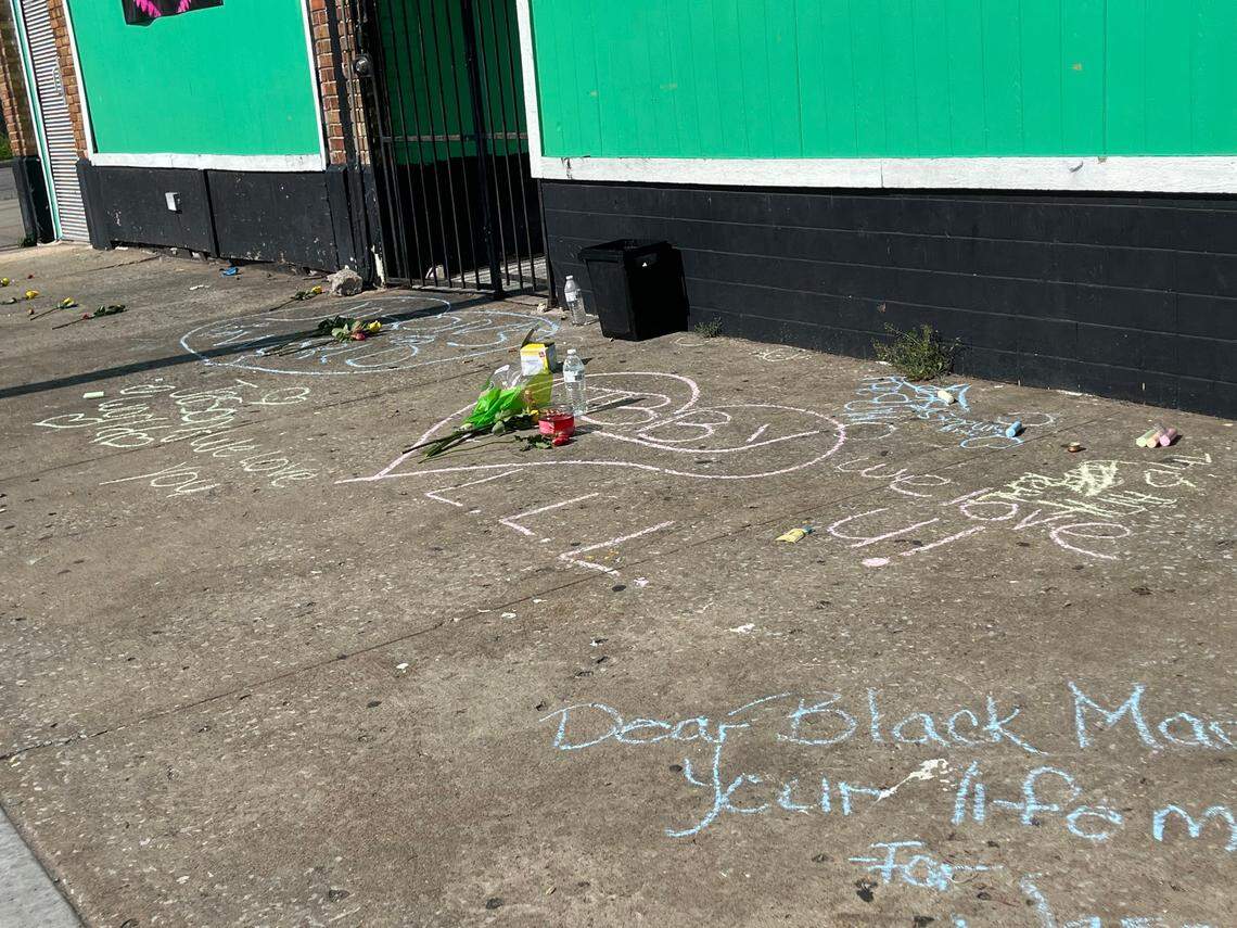 Messages were written in chalk on the sidewalk outside Klymax Lounge, 4242 Indiana Ave., Kansas City, on Sunday morning. Five people were shot at the nightclub the night before.