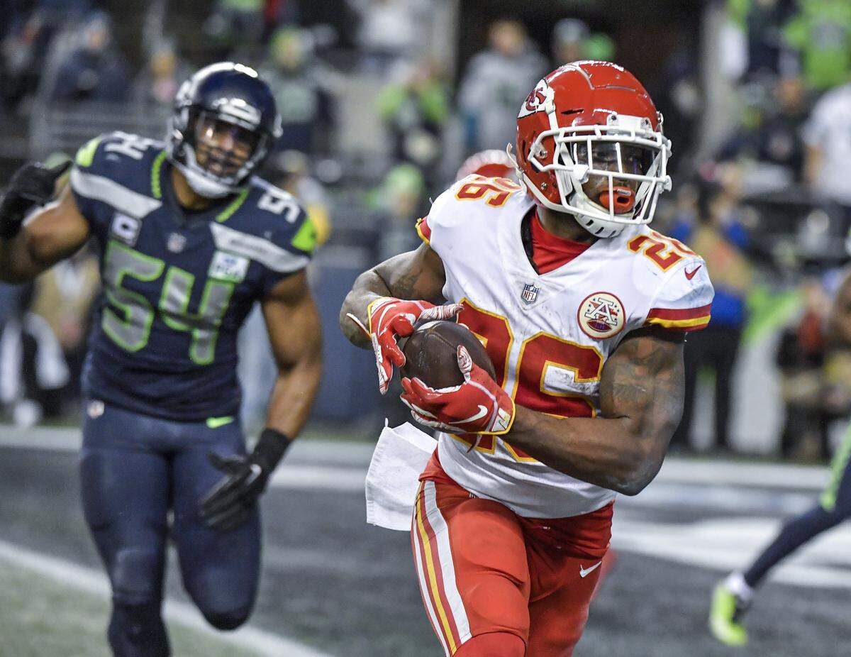 Kansas City Chiefs running back Damien Williams ran in for a touchdown after a short pass reception in the second quarter against the Seahawks in Seattle. It was Chiefs quarterback Patrick Mahomes’ 46th touchdown pass of the 2018 regular season.