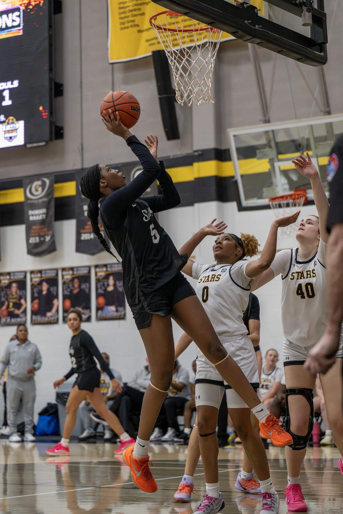 Destiny Manyawu shoots a layup during a basketball game against St. Teresa's Academy on Tuesday, Jan. 27, 2026 in Kansas City.
