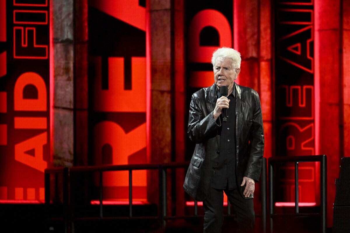 Graham Nash speaks onstage during the FIREAID Benefit Concert for California Fire Relief at The Kia Forum on January 30, 2025 in Inglewood, California.