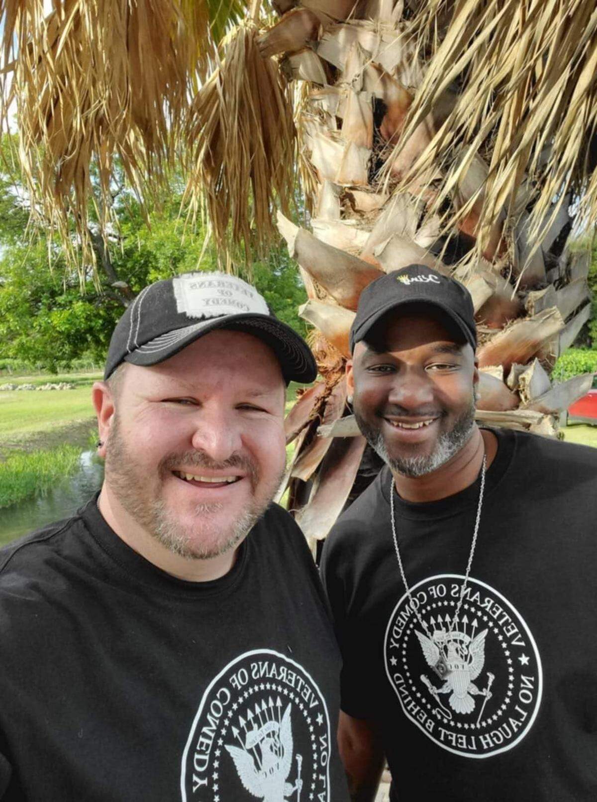 Tarik Hopkins (right) and friend and fellow comedian William Clifton (left) after performing together at a comedy show.