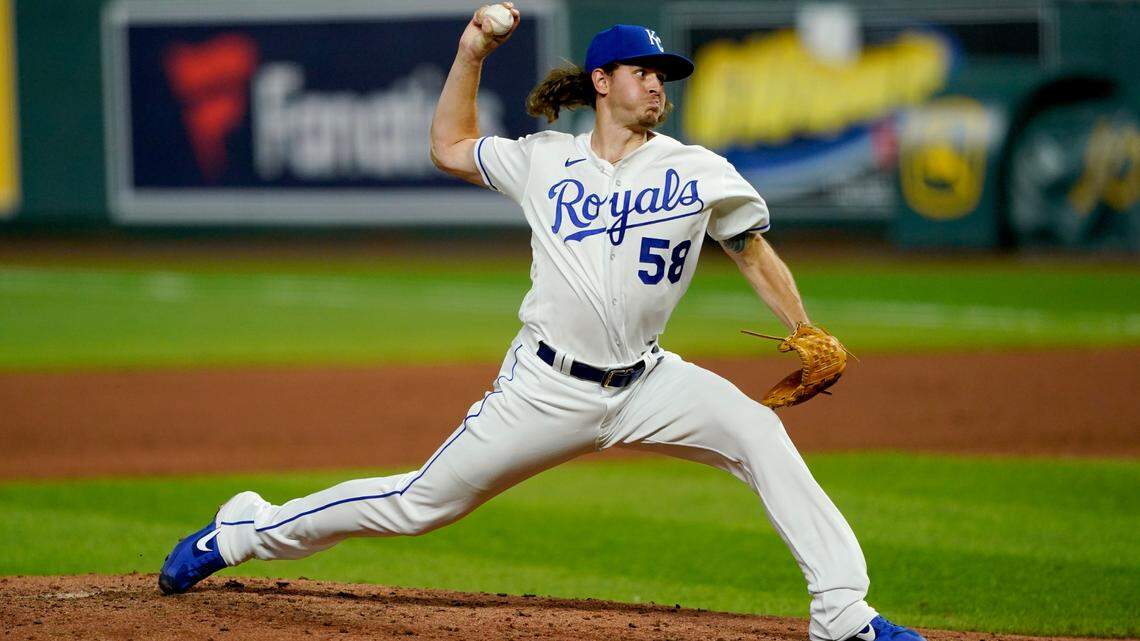 Kansas City Royals relief pitcher Scott Barlow throws during the sixth inning of a baseball game against the Chicago White Sox Friday, July 31, 2020, in Kansas City, Mo. (AP Photo/Charlie Riedel)
