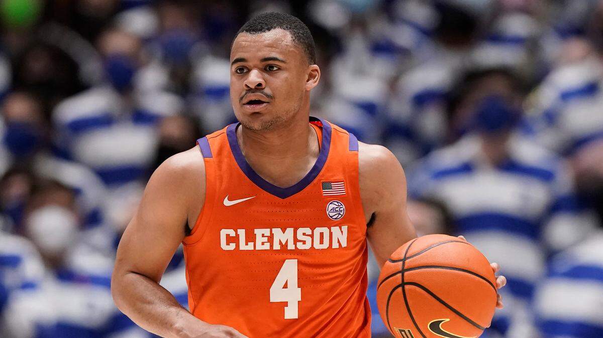 Clemson guard Nick Honor (4) dribbles against Duke during the first half of an NCAA college basketball game in Durham, N.C., Tuesday, Jan. 25, 2022. (AP Photo/Gerry Broome)