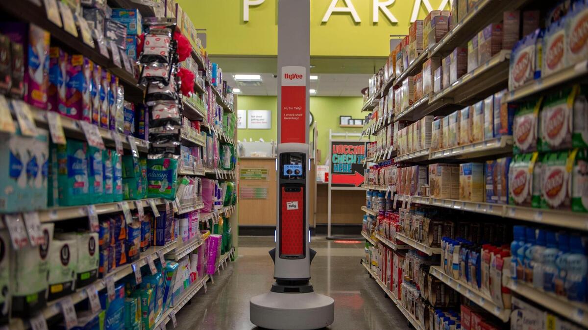 An inventory robot named Tally swivels its way through aisles at Hy-Vee in Lee’s Summit. It checks the amount of product on hand and emails the store if something needs restocking.
