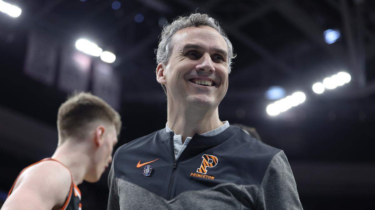 Princeton Tigers head coach Mitch Henderson celebrates the victory against the Arizona Wildcats at Golden 1 Center on March 16, 2023.