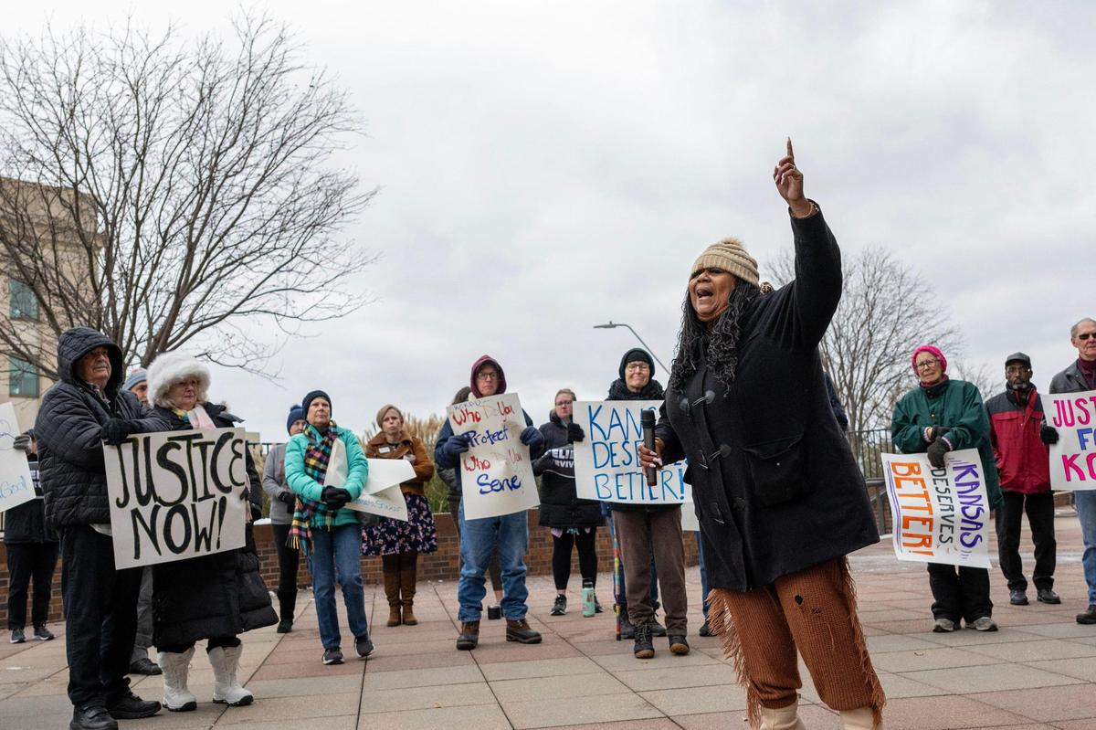 Laqunada Jacobs of Little Rock, Arkansas, sings to the crowd outside the Frank Carlson Federal Building in Topeka, sharing her message of solidarity for the victims in the Roger Golubski case, on Monday, Dec. 2, 2024. Several people were at the federal building in Topeka to show support for Golubski’s alleged victims until the news broke that he was found dead at his home in Edwardsville, Kansas, on the morning his trial was supposed to begin in Topeka.