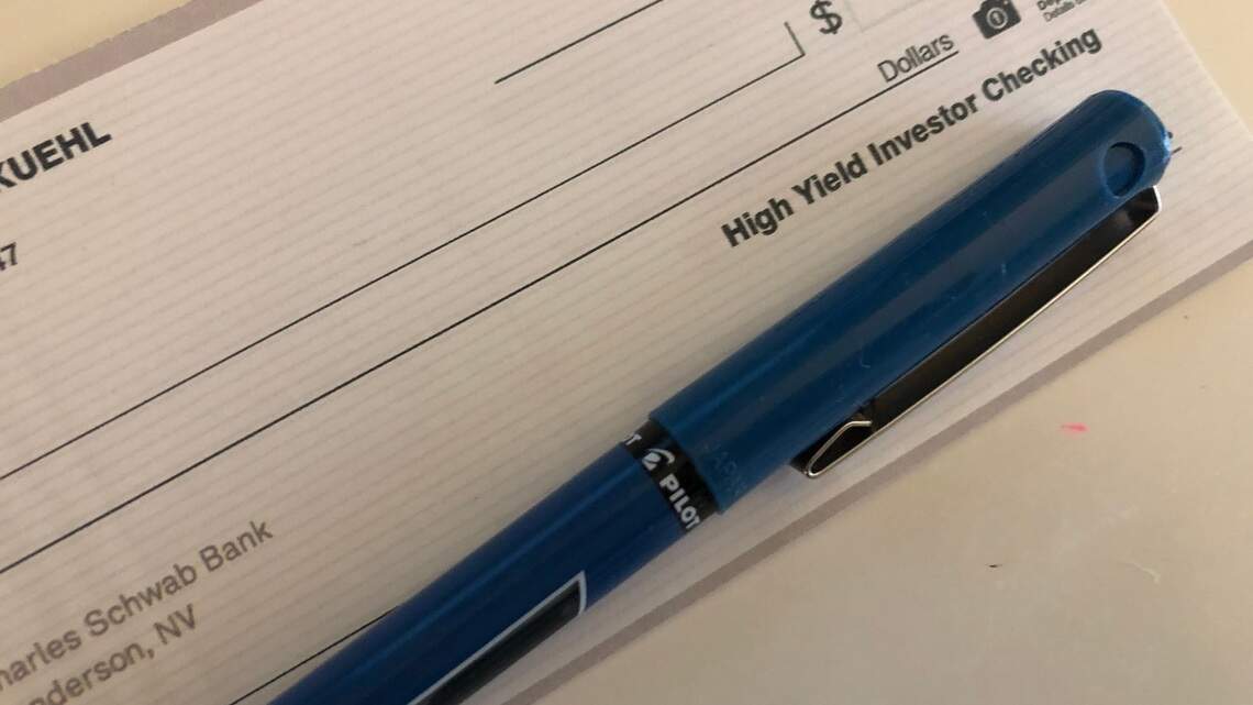 A thing of the past? Ask your kid what a traveler’s check is, and watch the reaction
