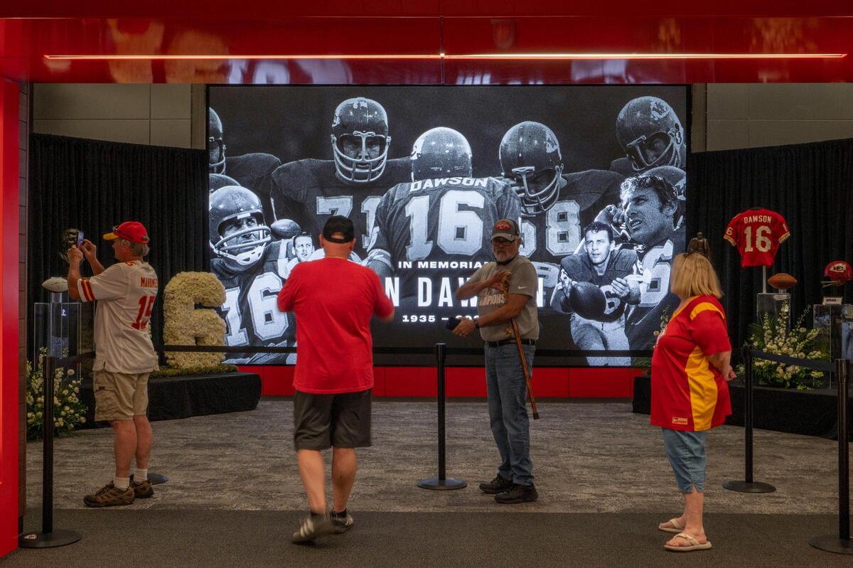 Kansas City Chiefs fans visited the Len Dawson memorial tribute on Thursday, Sep. 1, 2022, at Arrowhead Stadium.