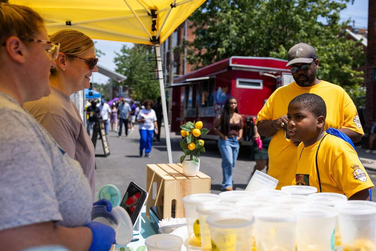 Alex Sidney, nine, orders a lemonade from Bossy B's Lemonade during JuneteenthKC 15th Annual Heritage Festival at E 18th Street on Saturday, June 20, 2026. “Its very good, I like it,” quoted Sidney.