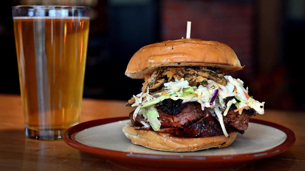 This big BBQ sandwich practically falls apart when you eat it. That’s half the fun
