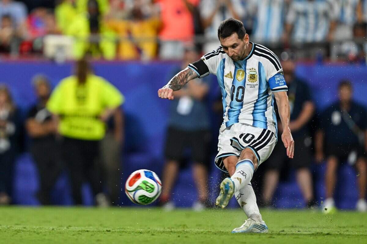 Argentina forward Lionel Messi (10) kicks the ball in extra time against Switzerland in a 2026 World Cup quarterfinal football match at Kansas City (Arrowhead) Stadium in Kansas City on Saturday, July 11, 2026.