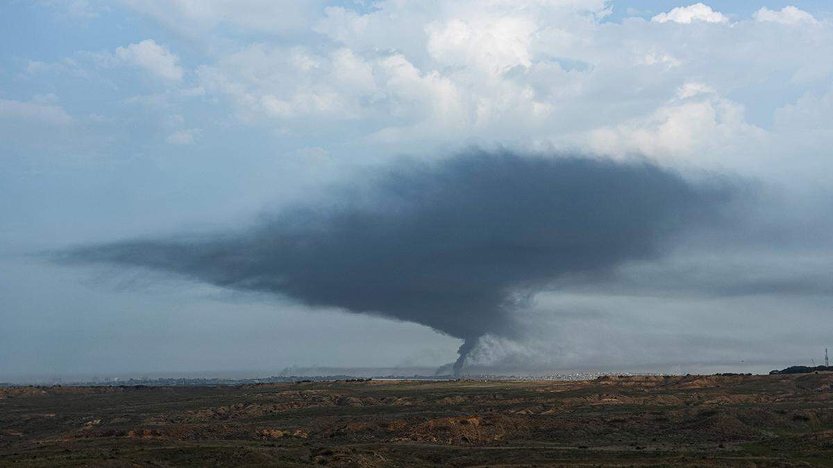 A cloud of smoke rises over the Gaza Strip on Dec. 27.