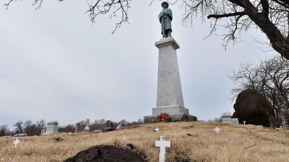Critics said a Confederate monument in Fairview & New Hope Cemeteries in Liberty is a symbol of racism and not a grave marker. In November 2020, the statue’s defenders installed a plaque bearing the names of some Confederate veterans buried at the site and placed small white crosses to symbolize their graves.