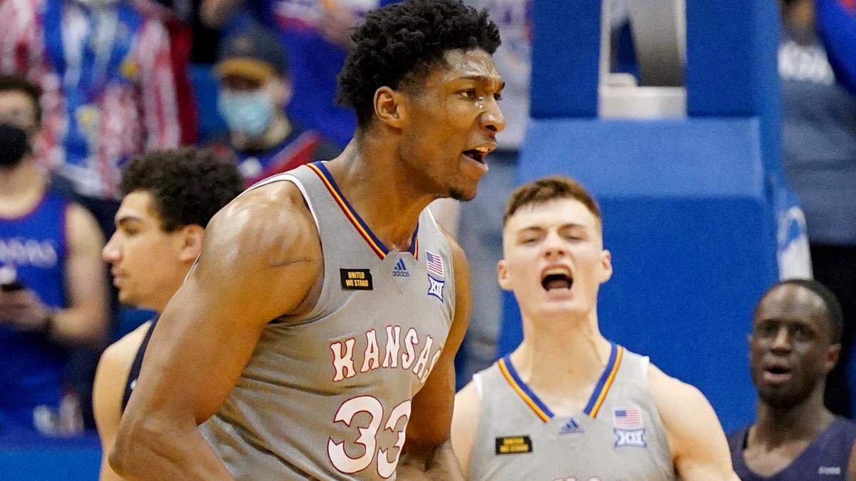 Kansas Jayhawks forward David McCormack (33) celebrates after a score during the second half against the UTEP Miners at Allen Fieldhouse on March 4, 2021.