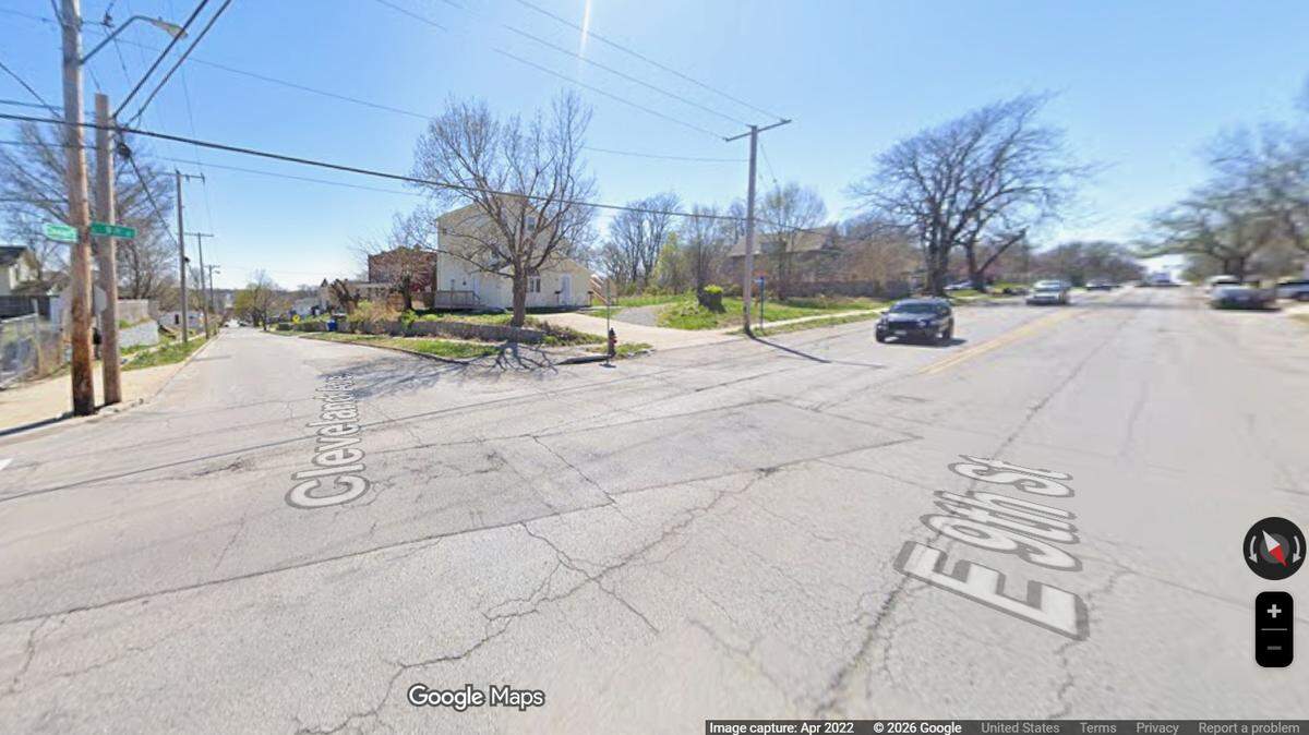 The intersection of E. 9th Street and Cleveland Ave is seen in a Google Maps image. An SUV ran off the road and hit a parked car and a tree near the intersection Wednesday night, police said. One passenger died, and the driver and three juvenile passengers were hospitalized.