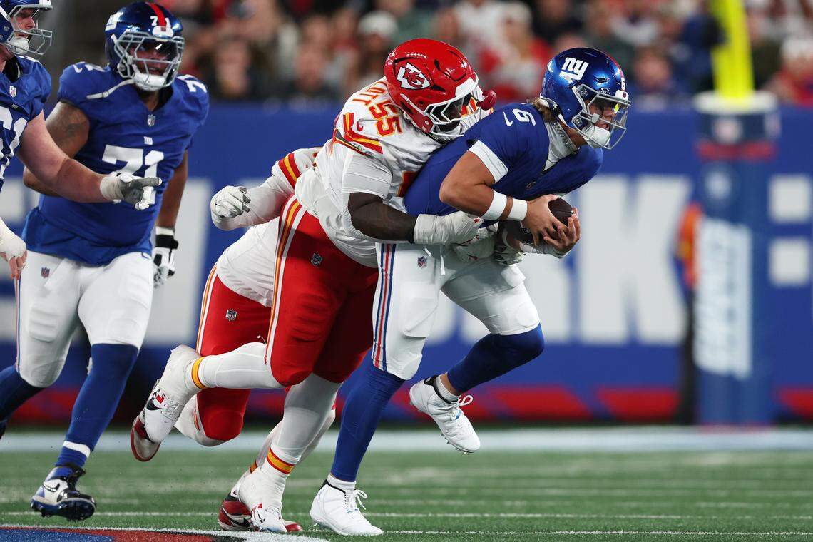 Kansas City Chiefs defensive tackle Omarr Norman-Lott (No. 55) tackles New York Giants quarterback Jaxson Dart during an NFL Week 3 game at MetLife Stadium in East Rutherford, New Jersey, on Sunday, Sept. 21, 2025.