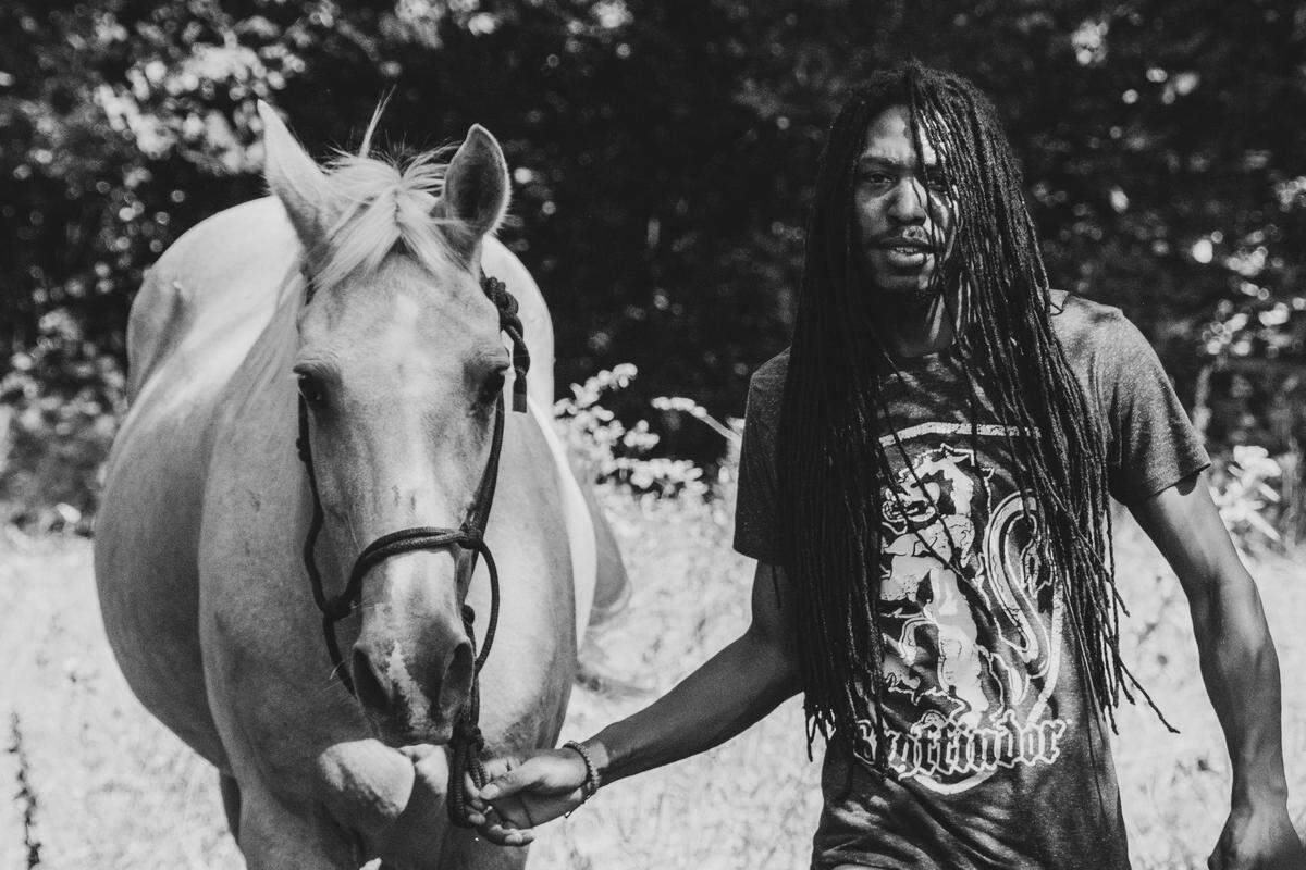 Your’Majesty El Bey aka YM Bey aka “Smoke,” walks his horse, Goldie, at the Copper Boyz Ranch in Kansas City. The Copper Boyz are a nonprofit on a mission to meet the inner city’s community needs with a focus on the area’s wild west history.