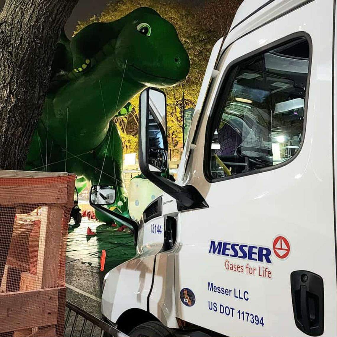 A Macy’s parade balloon checks out a Messer helium truck.
