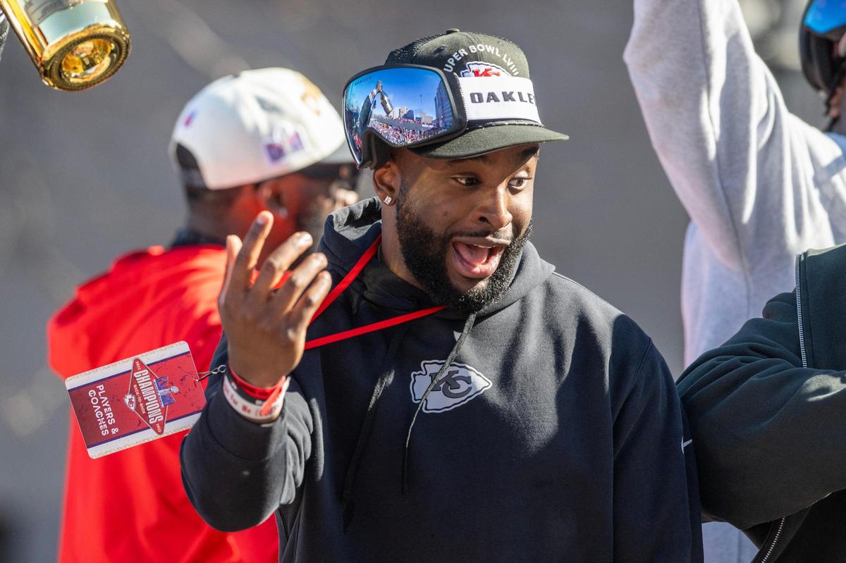 Kansas City Chiefs defensive end Felix Anudike-Uzomah yells out to fans during the Chiefs victory parade on Wednesday, Feb. 14, 2024, in Kansa City.