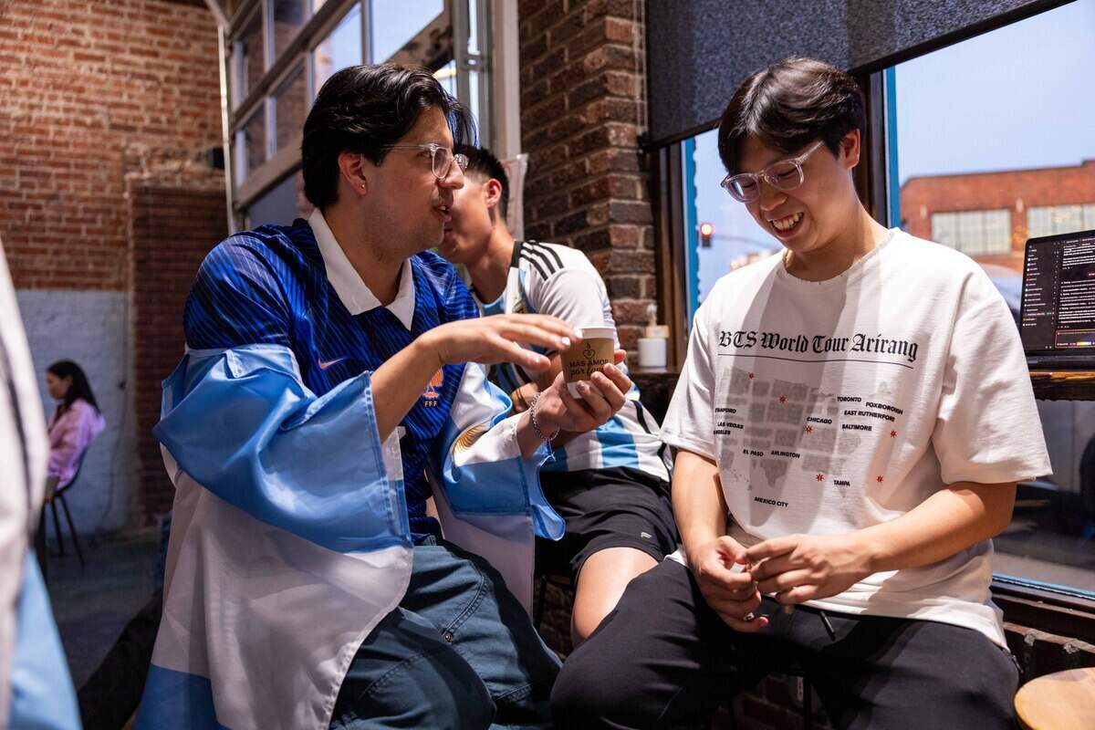 Fans at Café Corazón on Southwest Boulevard talk during a watch party for the World Cup game between Algeria and Argentina, which was held in Kansas City, on Tuesday, June 16, 2026.