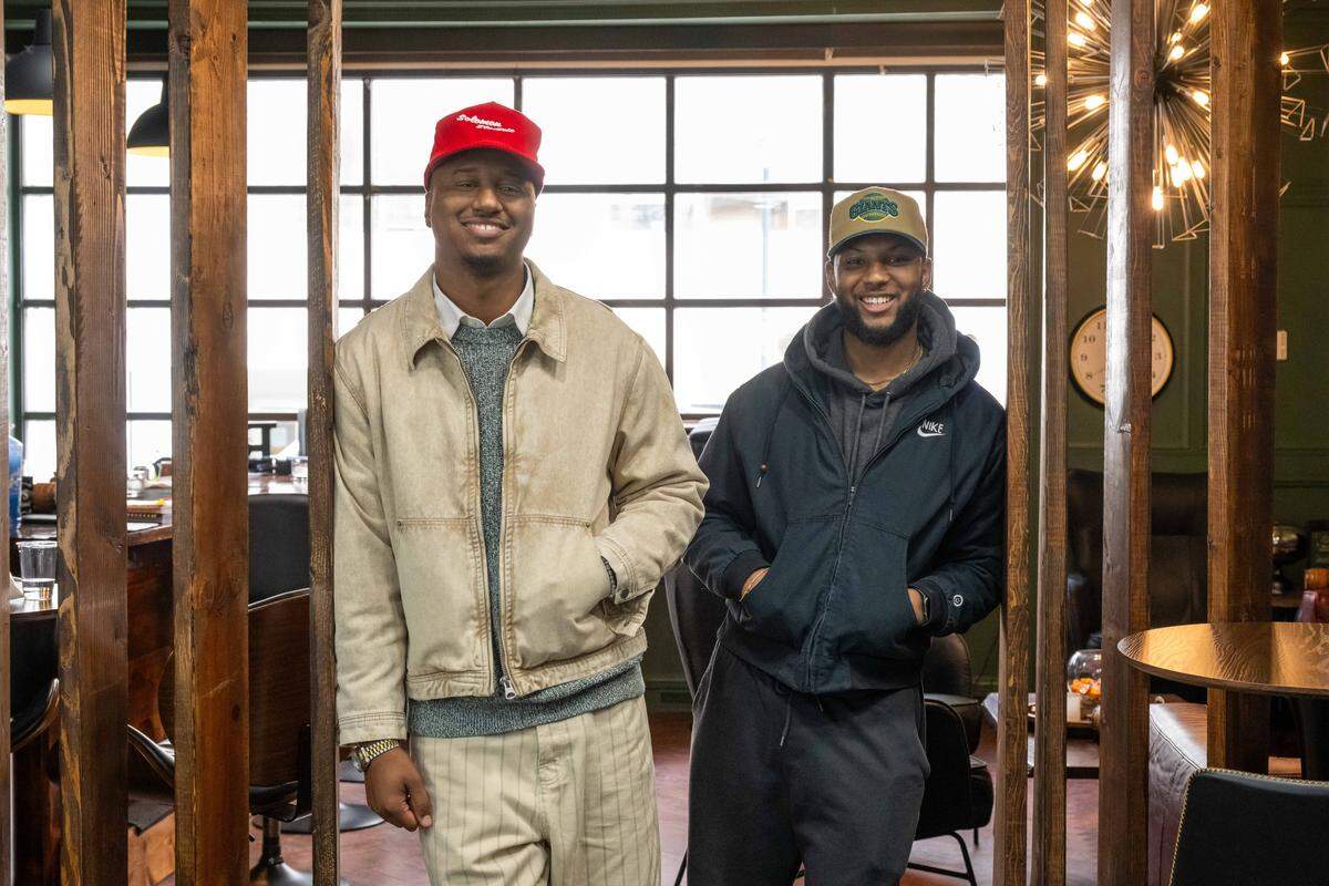 Jalen Toure Ford and Tyler Boston, co-owners of Klassic Guy Barber Lounge on 9th, on Tuesday, February 3, 2026, in Kansas City. Part of an overall ownership group, Ford and Boston say their place provides a safe space for all.