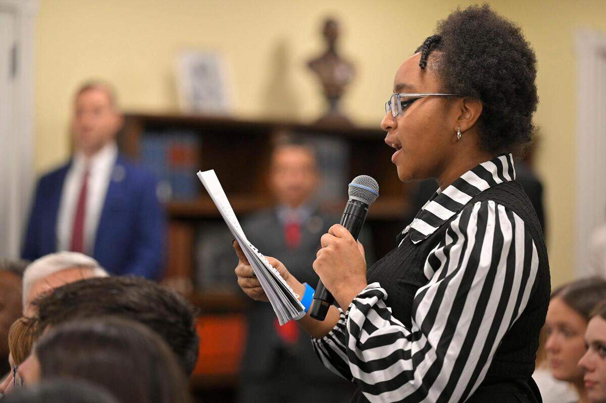 A student asked a question in the White House Decision Center on Wednesday, Sept. 27, 203, as area high school students discussed President Harry S. Truman’s decision to desegregate the U.S. military.