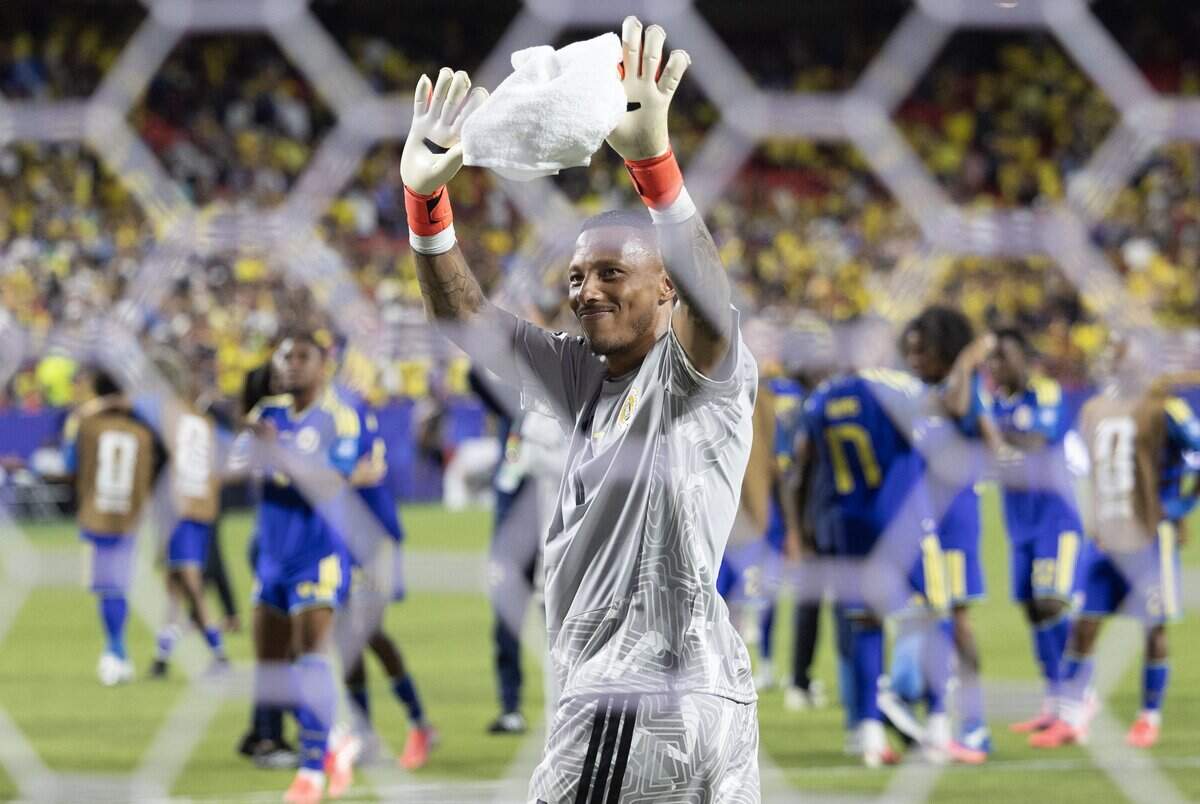 Curaçao goalkeeper Eloy Room (1) acknowledges the crowd after holding Ecuador to a draw after their FIFA World Cup group-stage soccer match at Kansas City (Arrowhead) Stadium in Kansas City on Saturday, June 20, 2026.