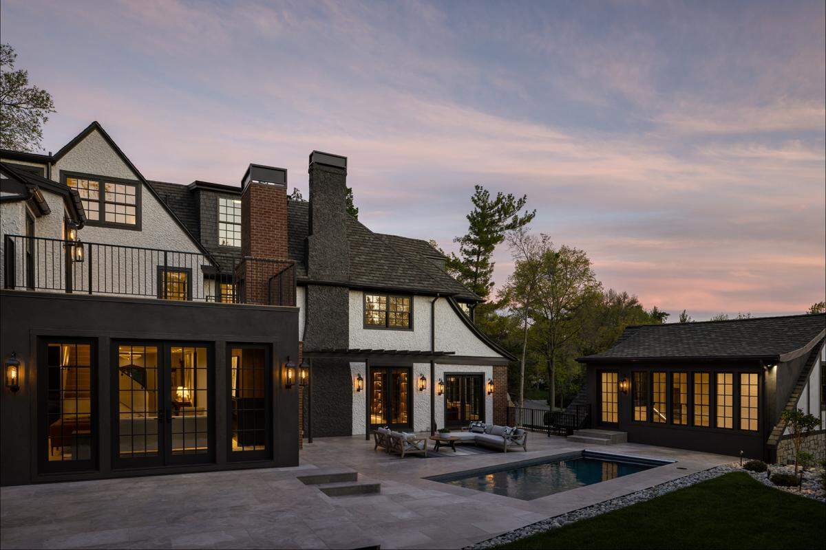 The backyard on the Mission Hills mansion’s property includes a heated in-ground pool, barbecue grill and pizza oven.