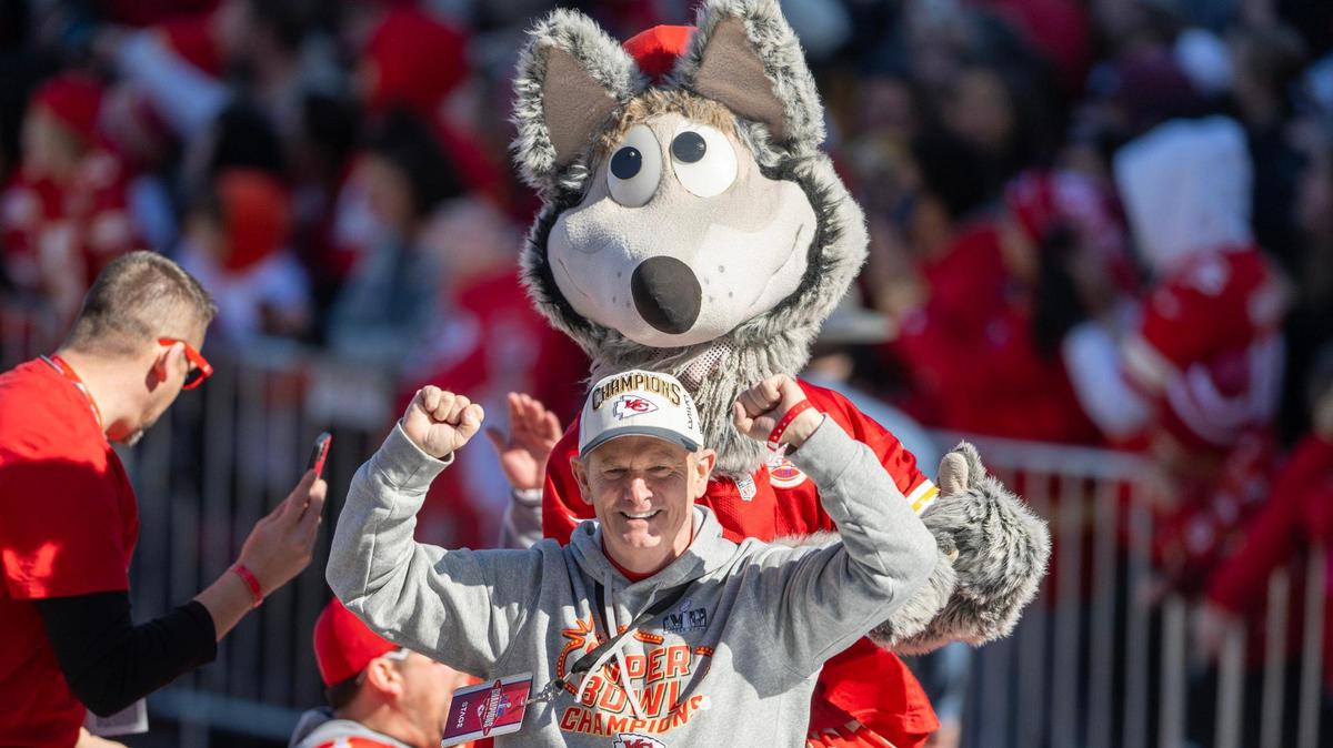 Mitch Holthus cheers with a crowd of fans during the Chiefs victory parade on Feb. 14 in Kansas City.
