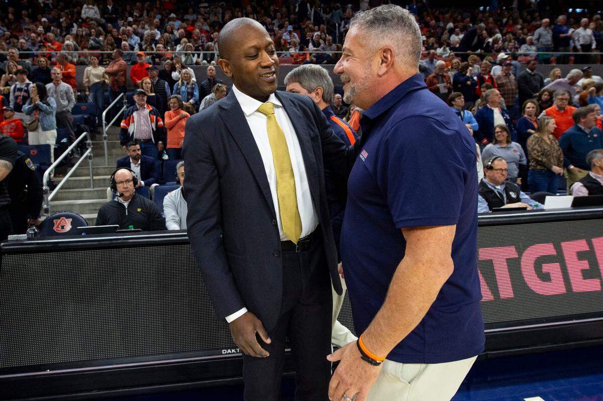 Missouri Tigers coach Dennis Gates greets Auburn coach Bruce Pearl ahead of a Saturday, Jan 4, 2025 men’s basketball game at Neville Arena in Auburn, Alabama.