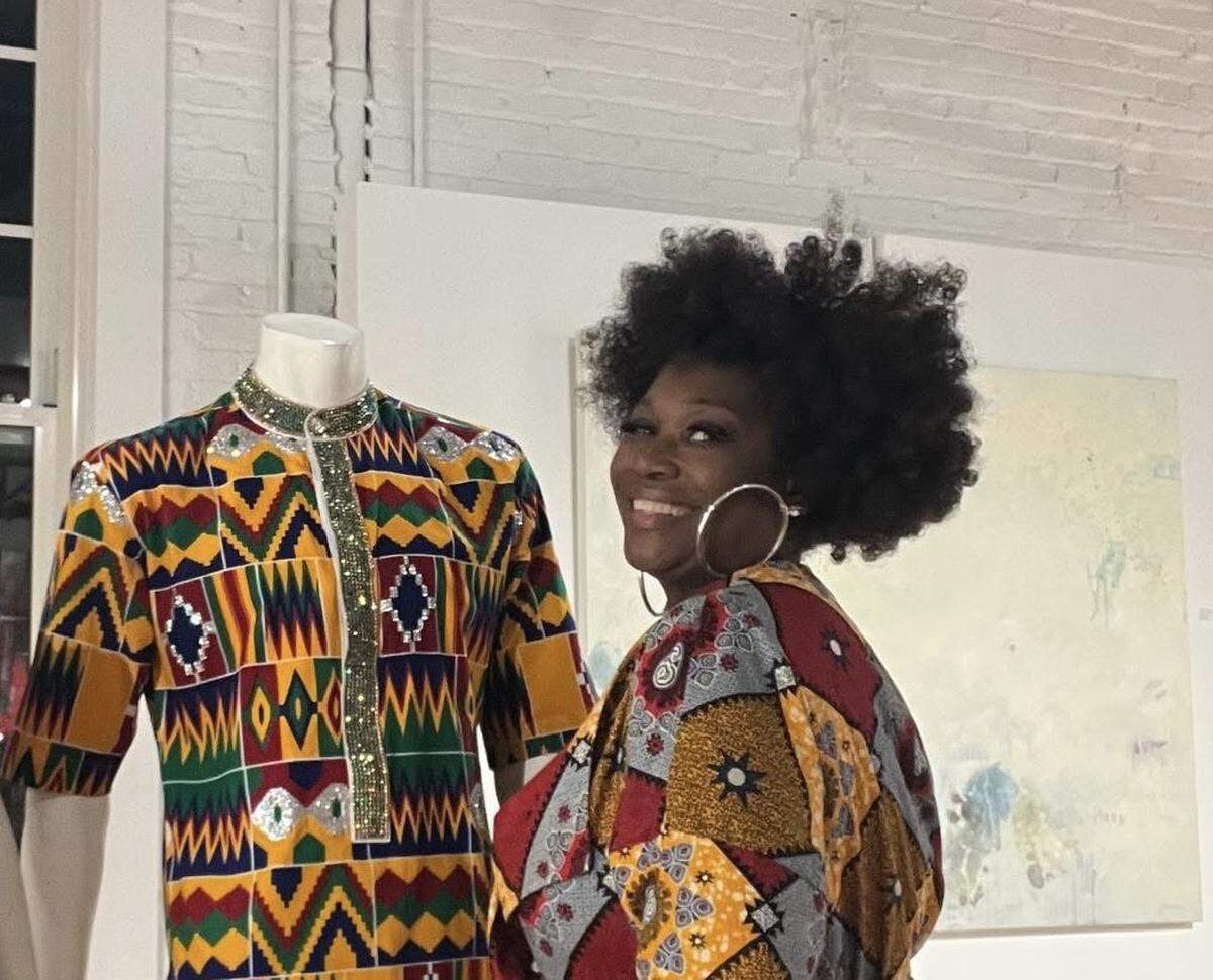 Local designer Kenya Martin crafts vibrant Afrocentric fashion with kente cloth and handmade detail, aiming for global reach while supporting local creatives.