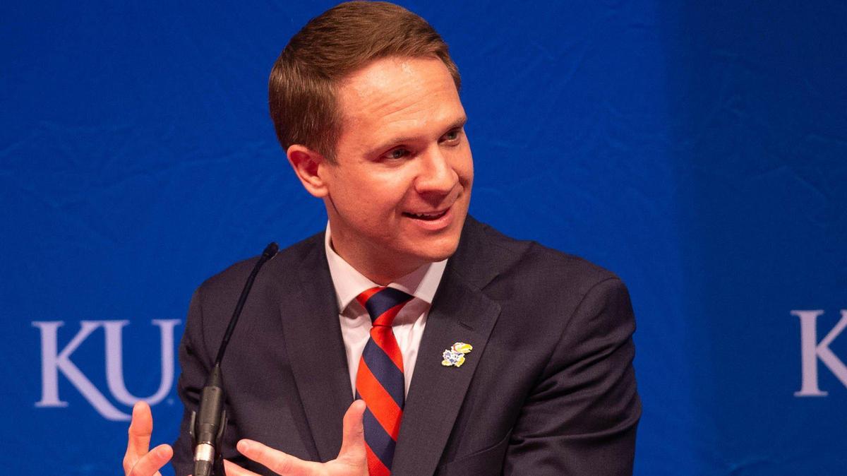 Kansas athletic director Travis Goff speaks to media at a press conference.