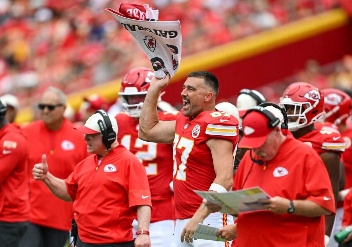 Kansas City Chiefs tight end Travis Kelce (87) cheers from the sidelines in the second quarter of the Kansas City Chiefs vs. Los Angeles Rams preseason game at Arrowhead Stadium in Kansas City on Aug. 15, 2026.