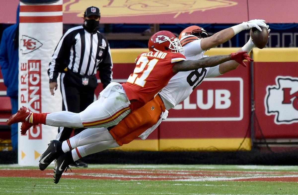 Cleveland Browns wide receiver Jarvis Landry makes a catch as Kansas City Chiefs cornerback Bashaud Breeland tries to break up the play in the fourth quarter of the AFC Divisional Playoff game between the Chiefs and the Cleveland Browns at Arrowhead Stadium Sunday, Jan. 17, 2021. The Chiefs defeated the Browns 22-17.