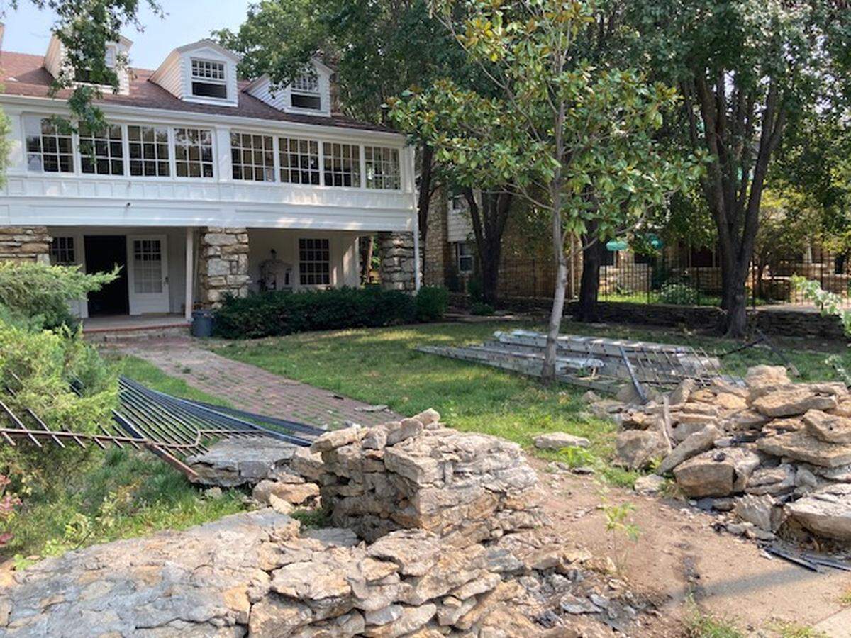 A reckless driver recently destroyed the limestone wall and wrought iron fence bordering the “Rockhill Clubhouse,” a 6,200-square-foot home built circa 1902 by the late William Rockhill Nelson and being renovated by developer Johnny Youssef.
