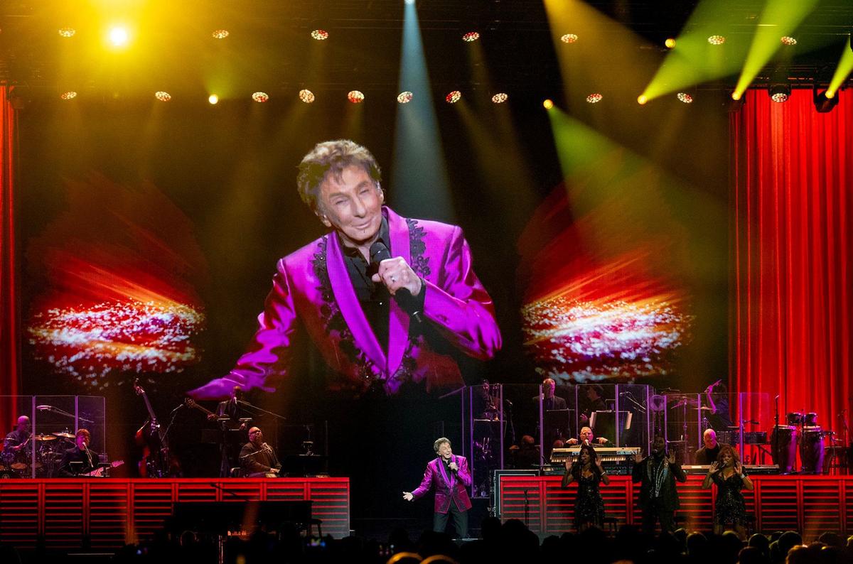 Barry Manilow performs on stage Sunday at the T-Mobile Center during a stop in Kansas City as part of The Last Concerts Tour.