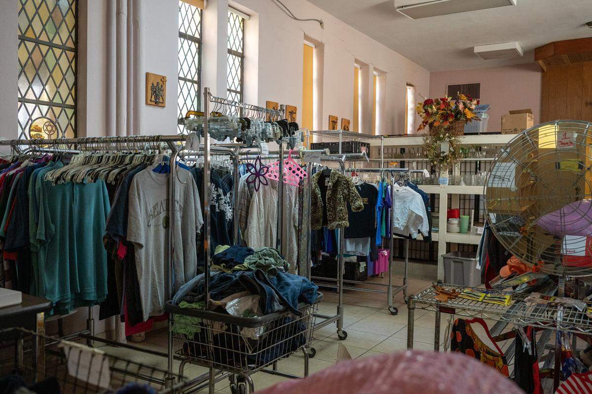 Clothing and other donated items fill a room at the Redemptorist Center on Monday, Nov. 3, 2025, in Kansas City. Clients can choose from clothing, shoes and household goods in addition to receiving food assistance.
