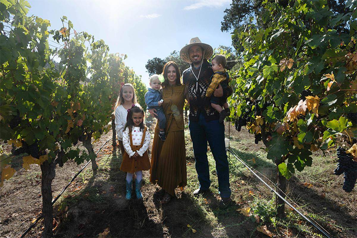 Whitney and Emily VinZant and family at their vineyard in Sonoma Valley, California.