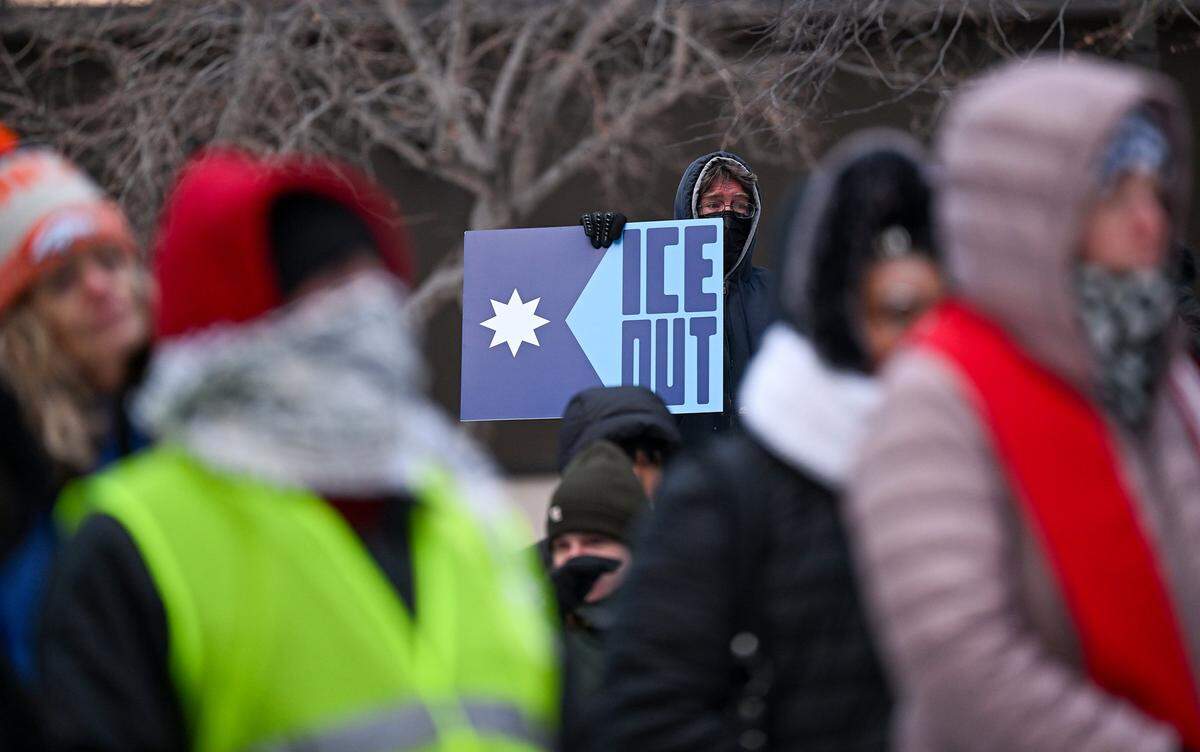 Protesters joined nationwide demonstrations against ICE in downtown Kansas City in freezing temperatures on Friday, Jan. 30, 2026.