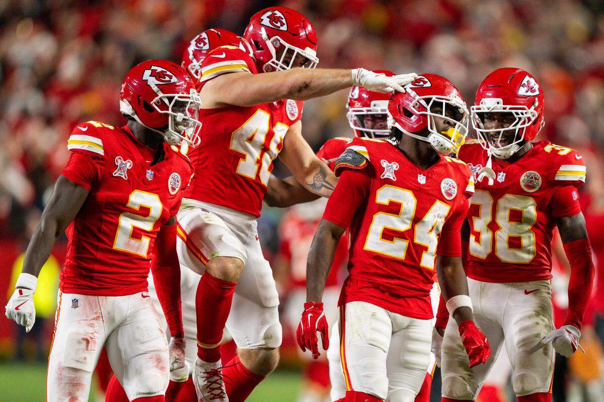 Kansas City Chiefs running back Brashard Smith (24) celebrates with teammates following a big kickoff return in the second half of the Chiefs game vs. the Denver Broncos on Thursday, December 25, 2025, at GEHA Field at Arrowhead Stadium.