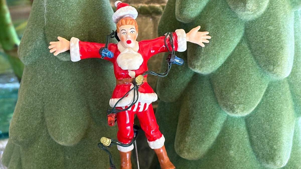 Sherry Kuehl’s Snow Village collection runs the gamut from nativity scenes to a ceramic figurine of the dad in the movie “Christmas Vacation” getting electrocuted.