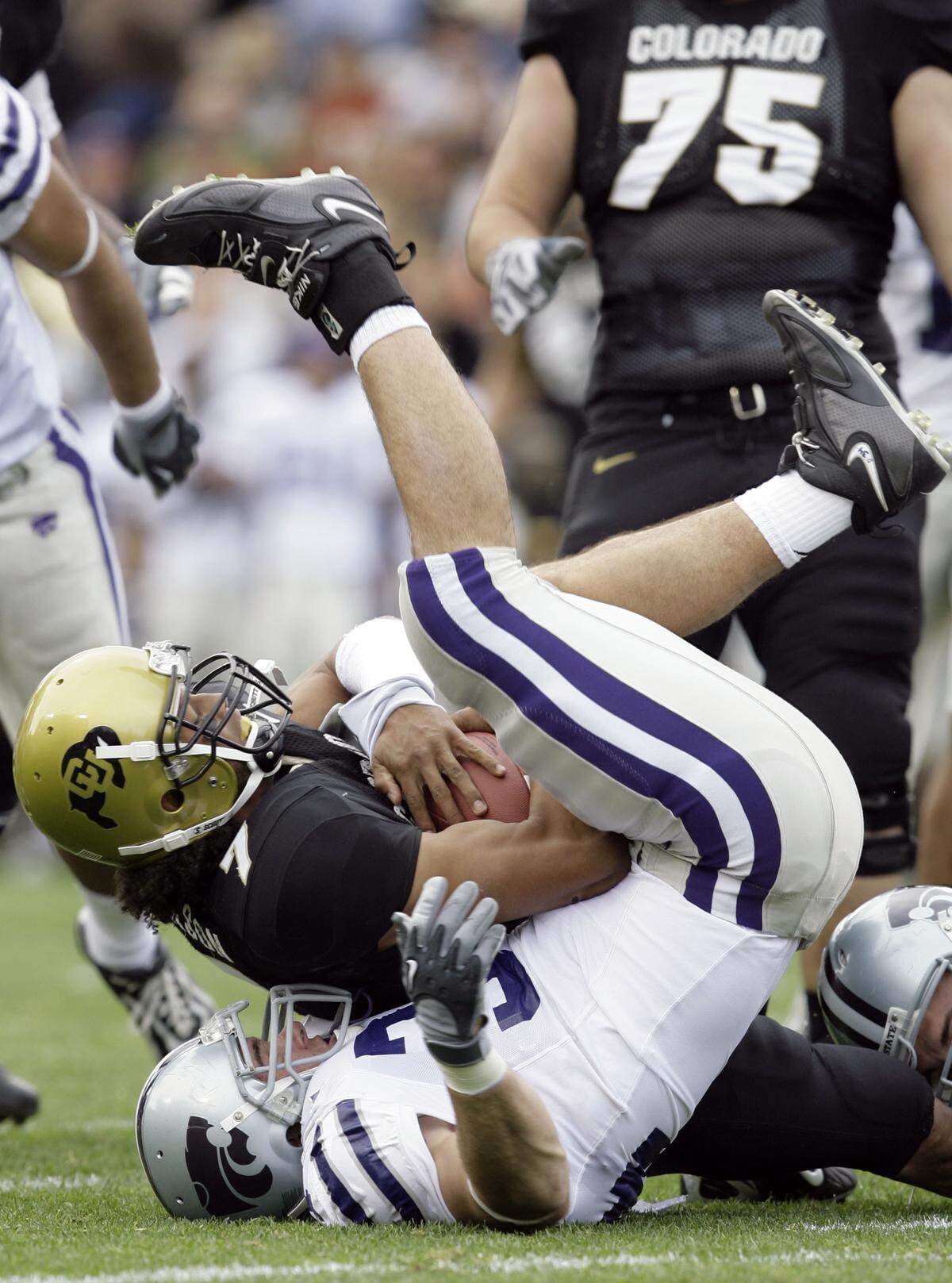 Before he became K-State's defensive coordinator, Blake Seiler was a defensive end for the Wildcats. He pulled down Colorado quarterback Bernard Jackson during a 2006 game.